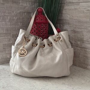 Michael Kors Ivory Pebbled Leather Drawstring Shoulder Hobo with Gold MK Charm